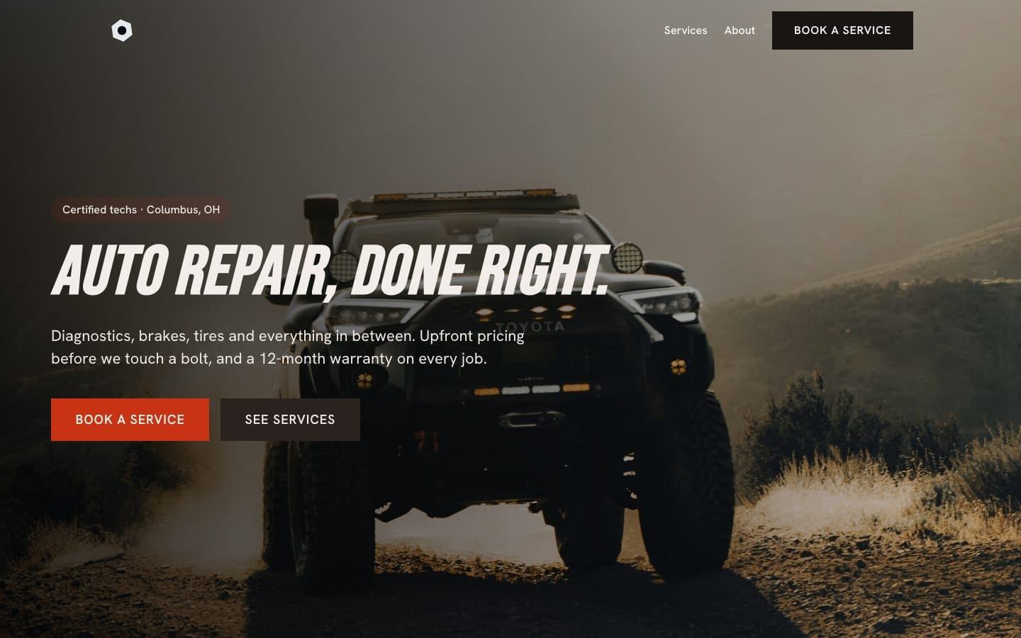 Camber, an auto repair site — dark hero with bold condensed headline over a truck on a dirt road